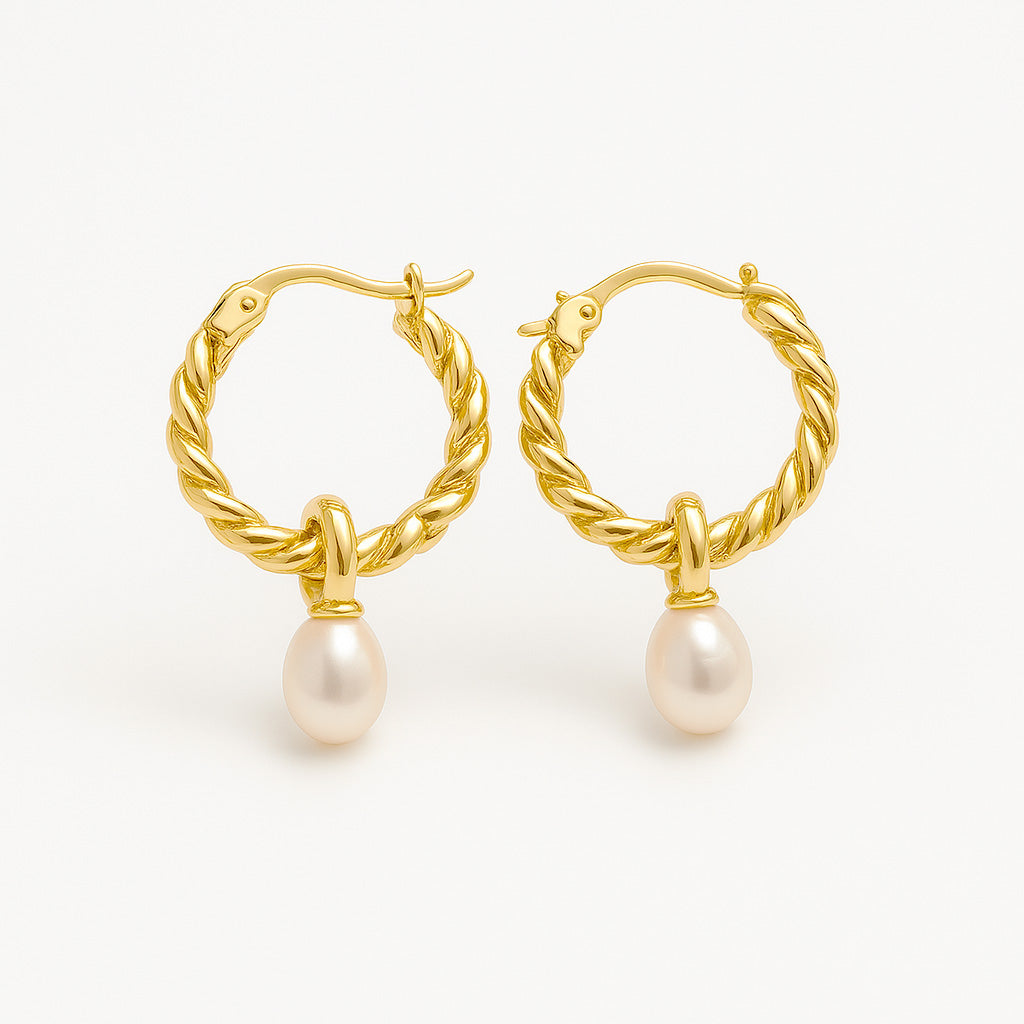 Boucle d'oreille de perle de baie